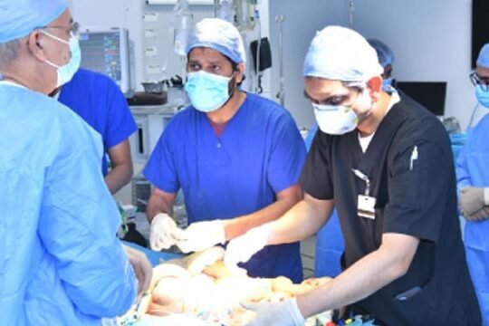 Surgeons conjoined sisters Karachi