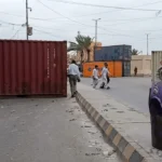 Karachi traffic police manage road closures at Society Signal