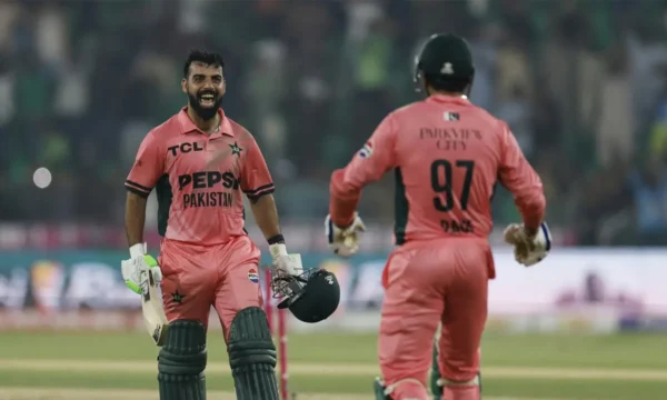 Shadab Khan celebrates his unbeaten century during Pakistan's one-wicket victory over England in the ODI Tri-Series.