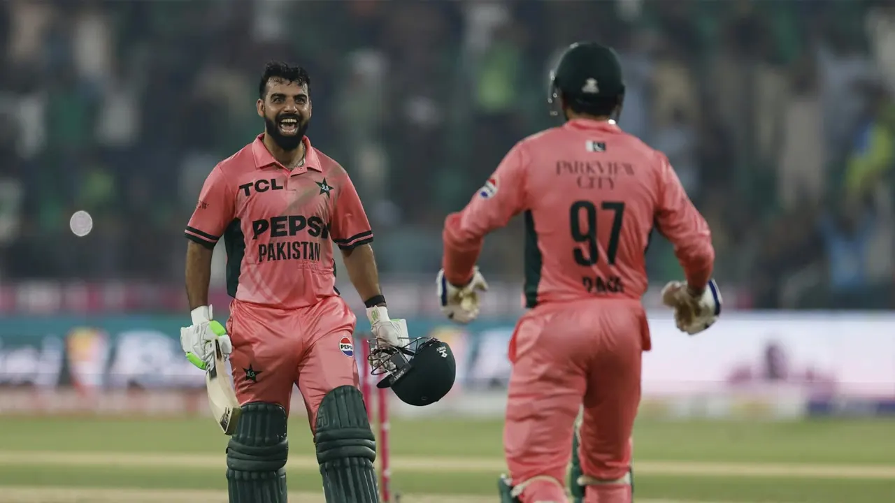 Shadab Khan celebrates his unbeaten century during Pakistan's one-wicket victory over England in the ODI Tri-Series.